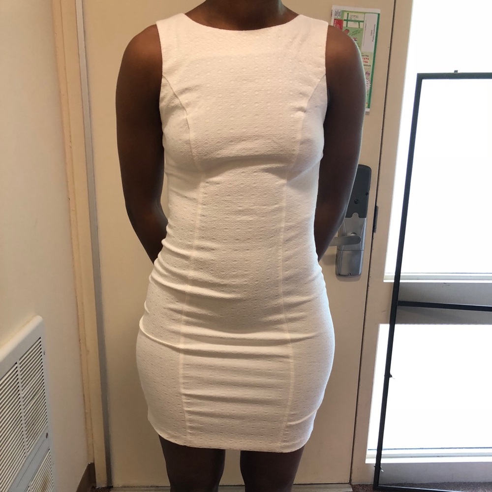 Plain white dress with caged back